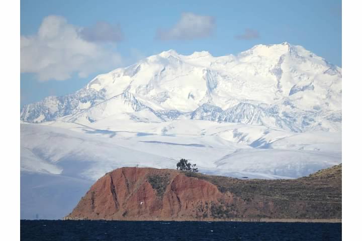 Moon Island in Lake Titicaca with the Andes in the background